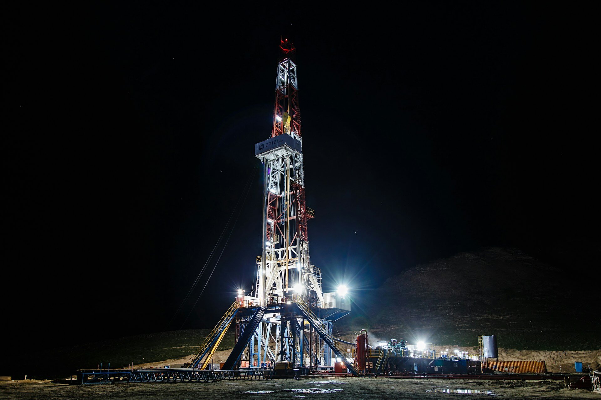 oil rig on land at night