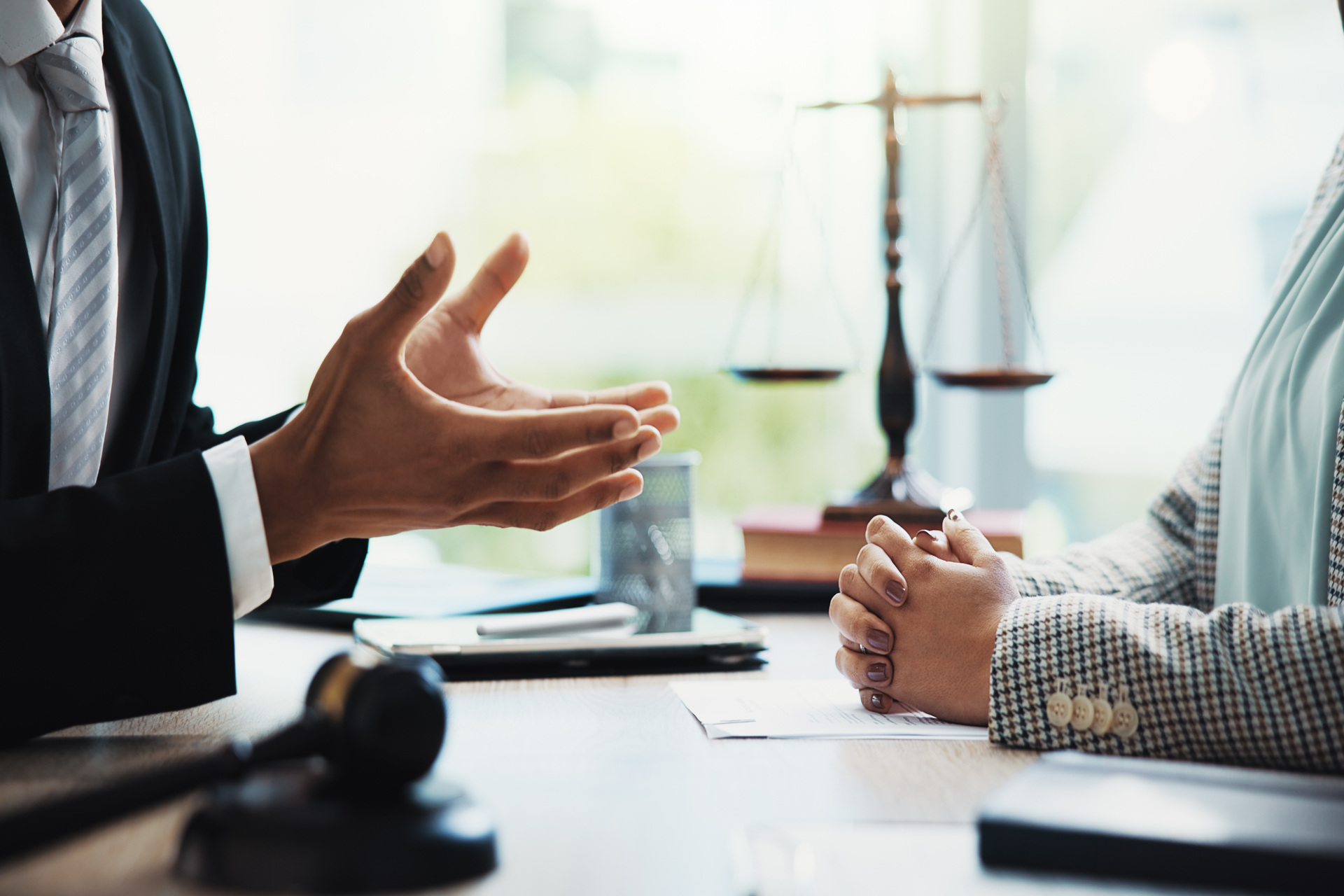 lawyer speaking with client