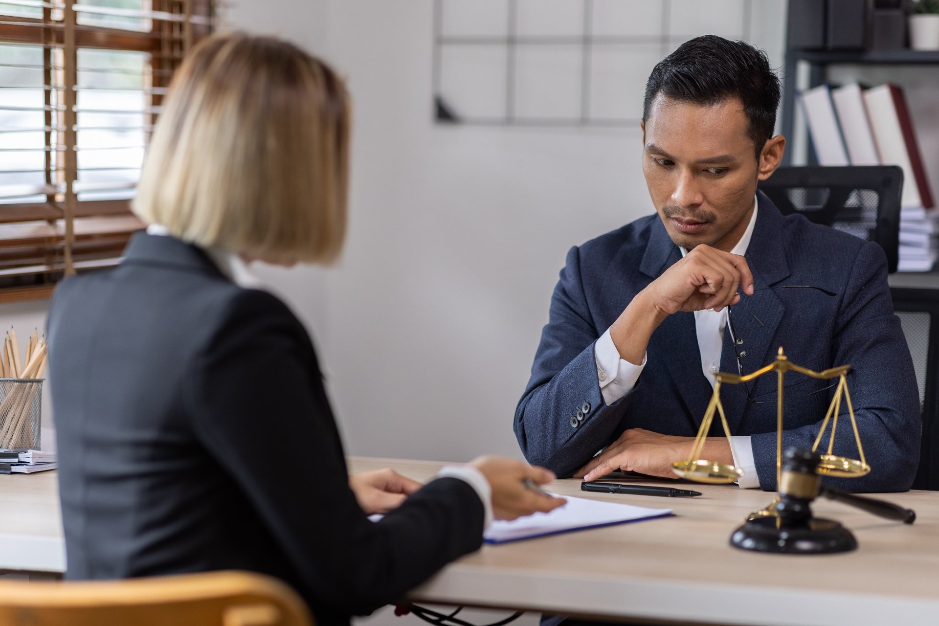 Lawyer discussing legal documents with a businessman