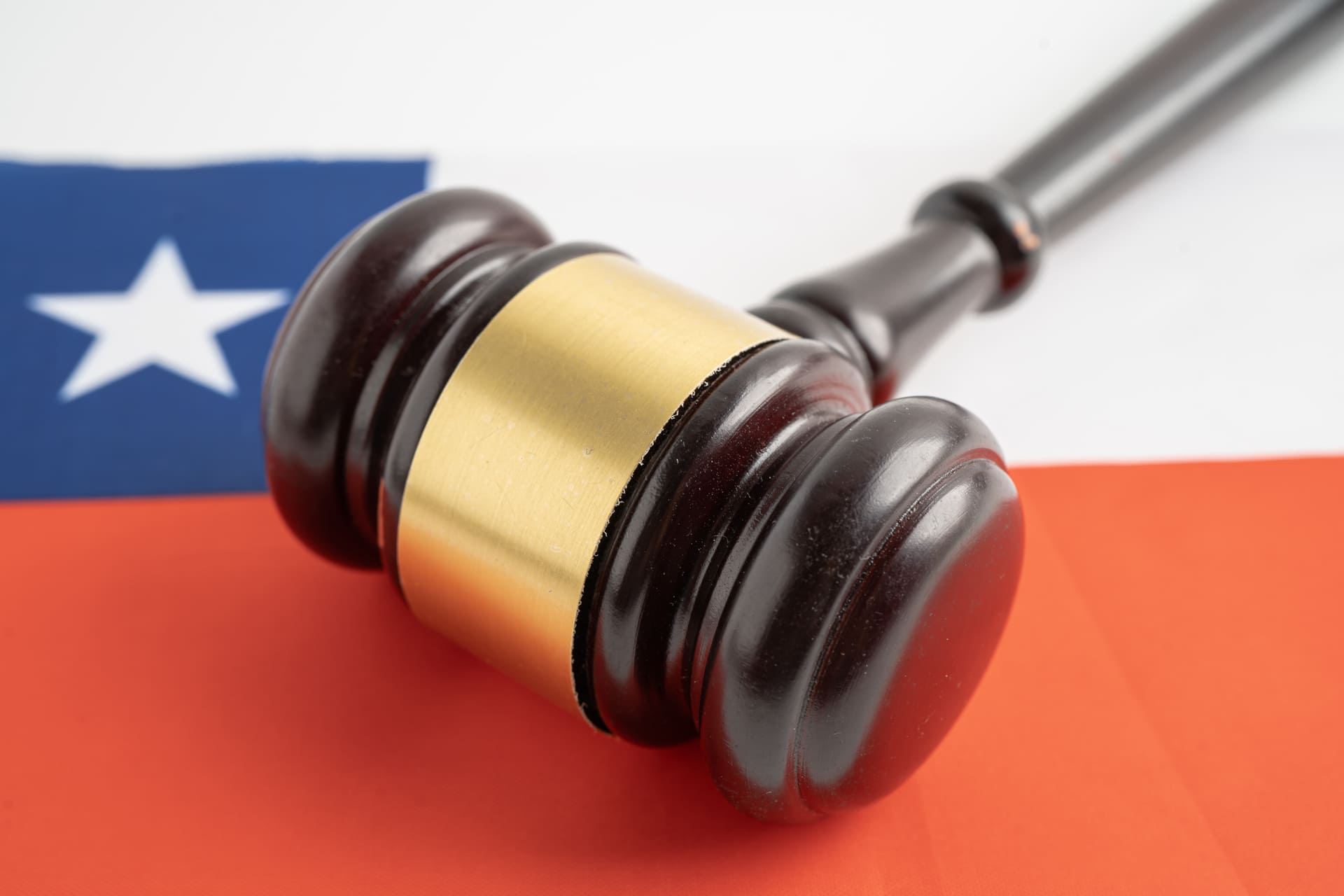 Mallet with flag in background